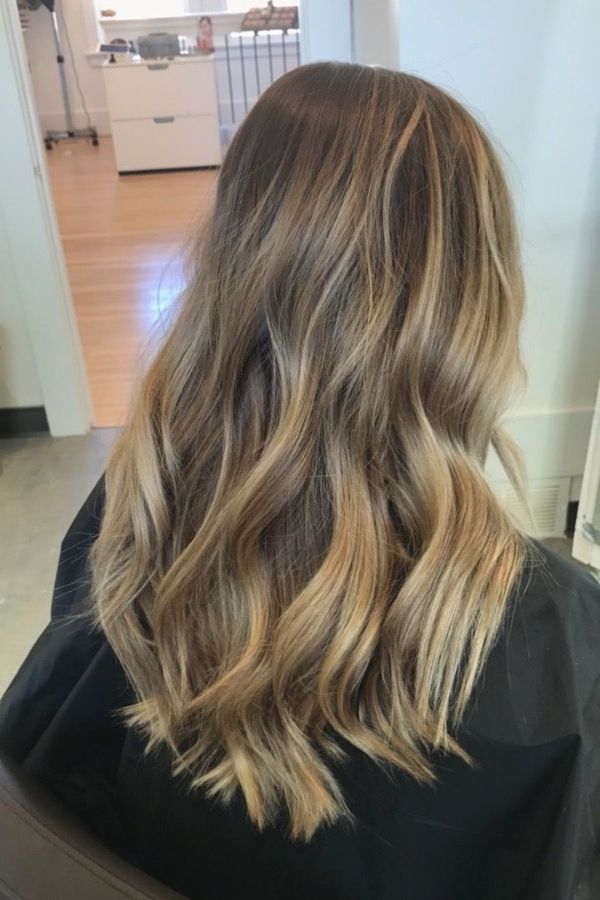 What is hair tinting and how does it differ from hair dyeing?