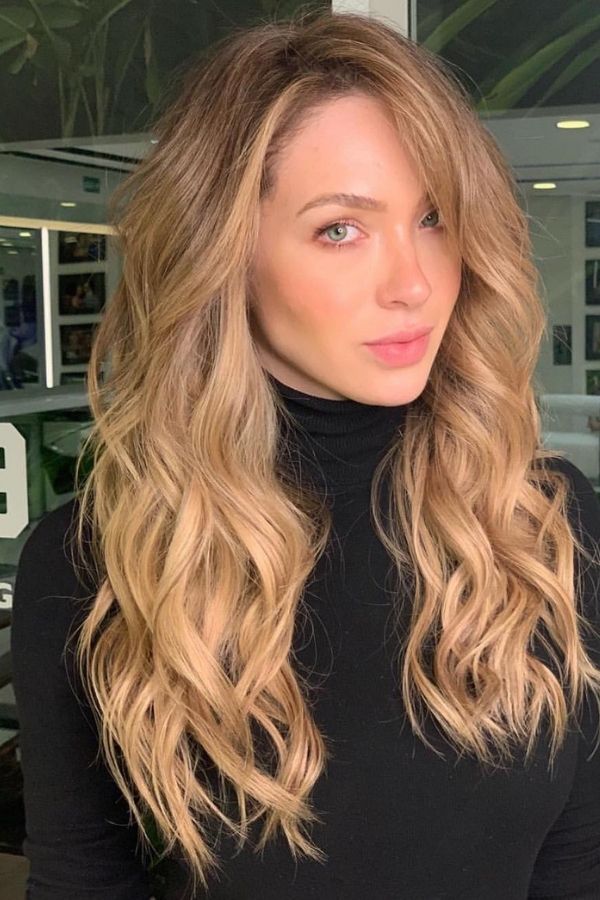 How can you tame fluffy hair?